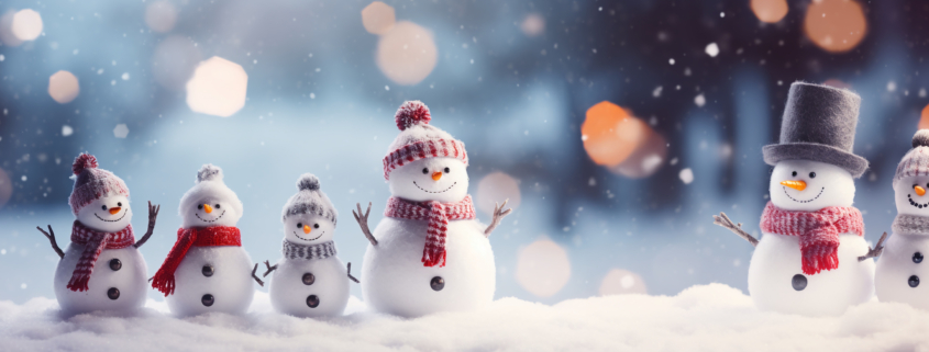 Happy Snowman Family Group in the snow